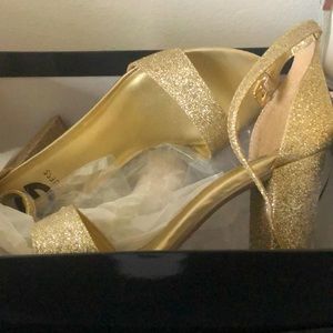 Brand new gold Guess heels!